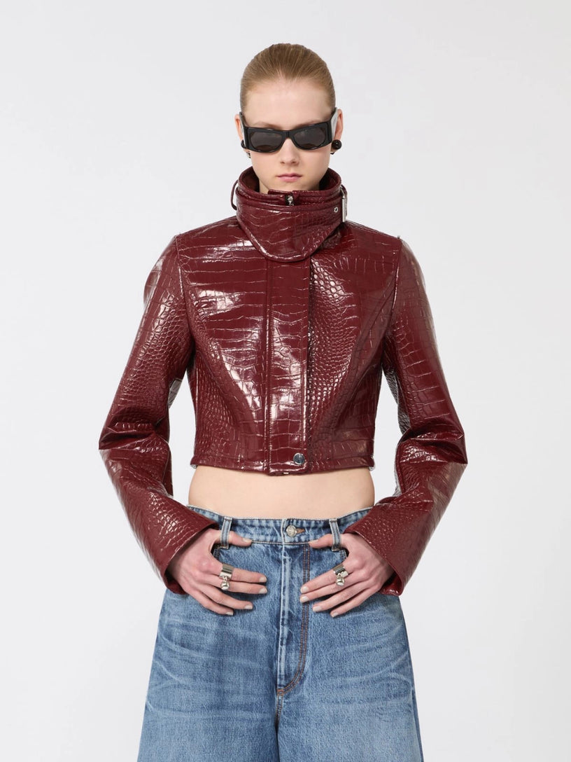 Patent leather cropped jacket with alligator print