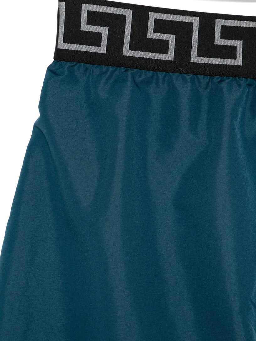 Swim shorts with Greca border